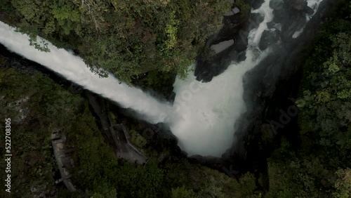 Devil's Cauldron Powerful Waterfall In Baños de Agua Santa, Ecuador - drone shot