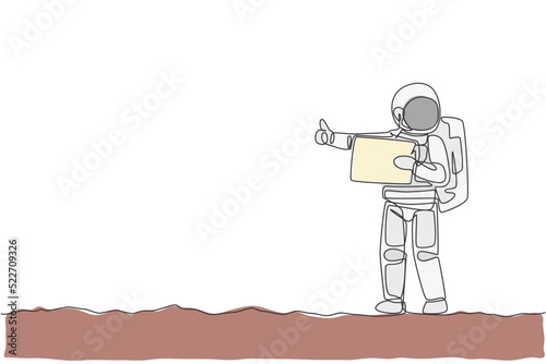 One single line drawing of astronaut hitchhiker holding paper board and wait at side of the road in moon surface vector illustration. Cosmonaut deep space concept. Modern continuous line draw design