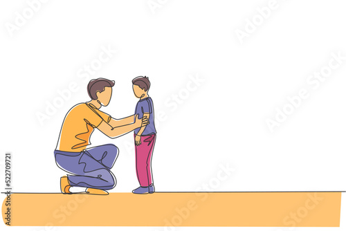 One continuous line drawing of young father giving some wise advice talk to his son at home, family life. Happy parenting concept. Dynamic single line draw graphic design vector illustration