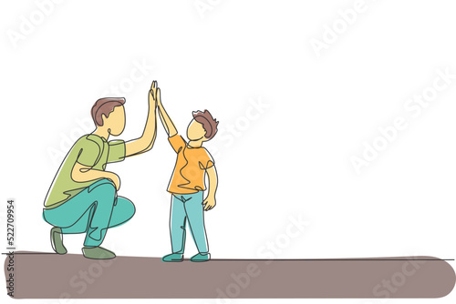 Single continuous line drawing of young dad giving high five gesture to son for success school achievement, parenthood time. Family parenting concept. Trendy one line draw design vector illustration