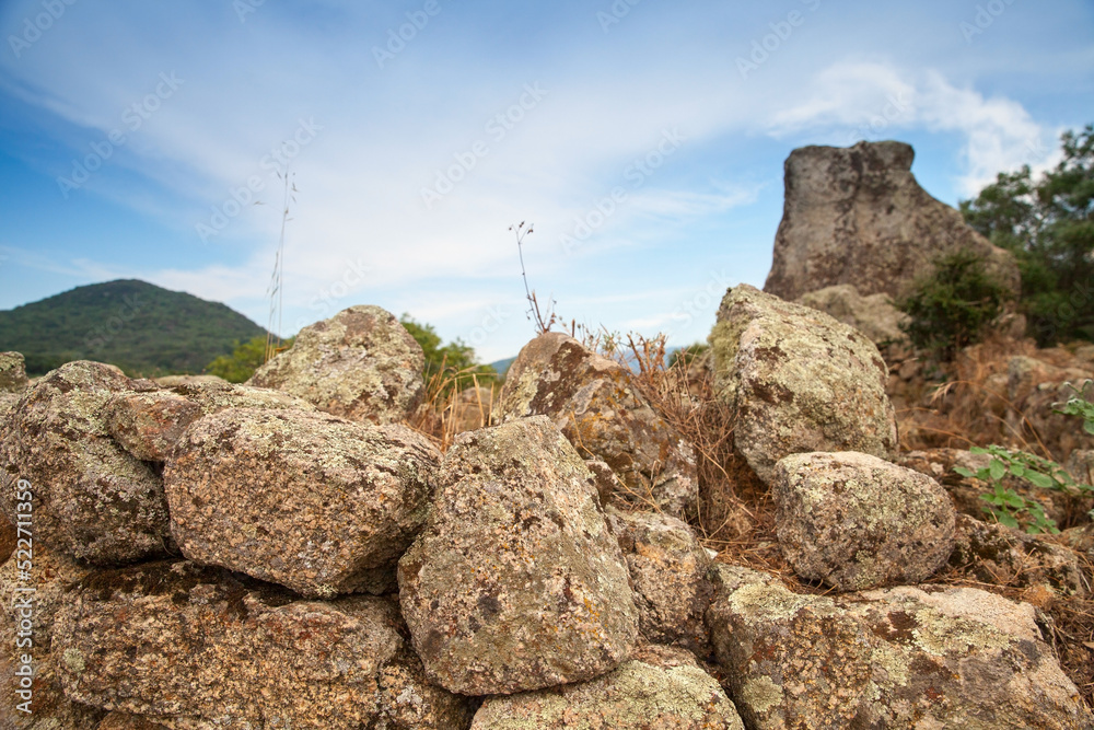 Fototapeta premium Summer landscape with ruins of Filitosa, megalithic site
