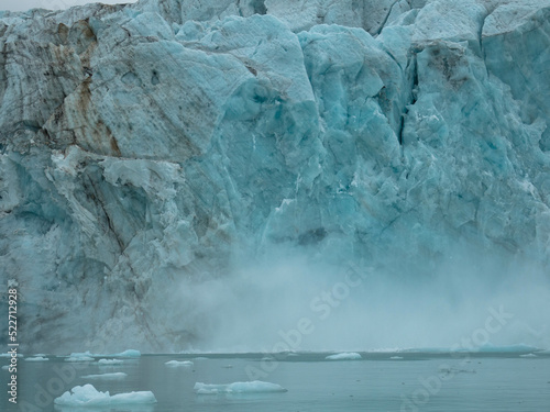 Samarinbreen ended in a calving front at Samarinvagan, a bay on the south side of the Hornsundfjord. Concept for climate change, global warming, north pole, cold nature. Svalbard, Norway photo