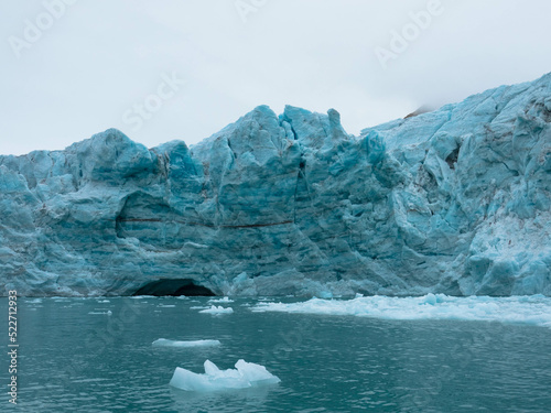 Samarinbreen ended in a calving front at Samarinvagan, a bay on the south side of the Hornsundfjord. Concept for climate change, global warming, north pole, cold nature. Svalbard, Norway photo