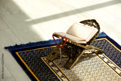 Canvas Print Rehal with open Quran and Misbaha on Muslim prayer rug indoors, space for text