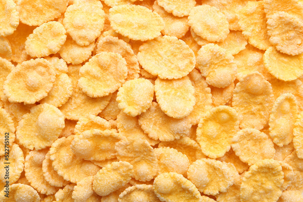 Sweet tasty corn flakes as background, top view Sweet tasty corn flakes as background, top view