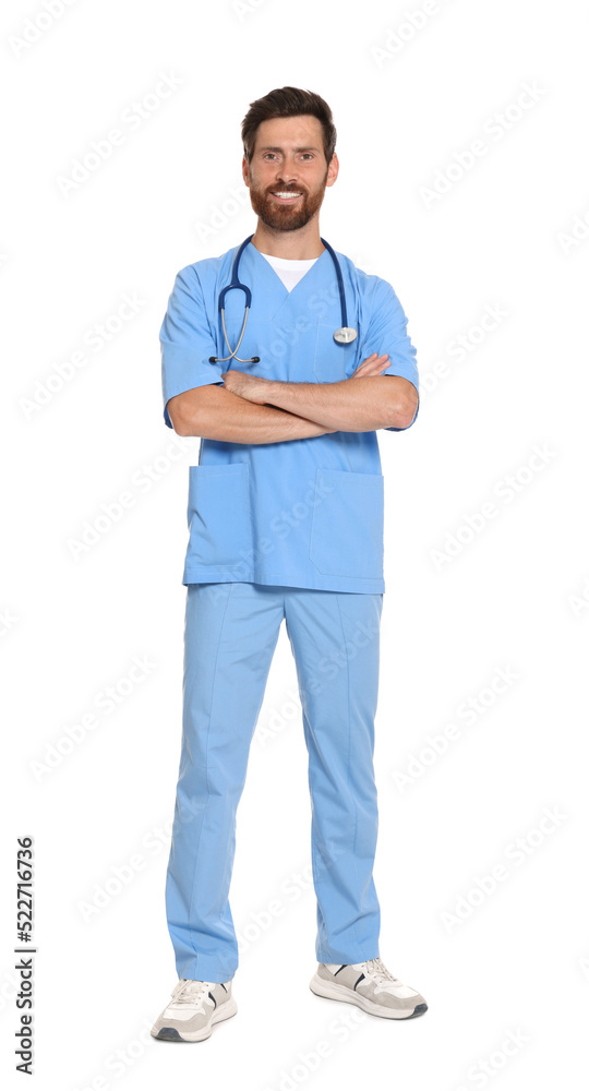 Full length portrait of doctor in scrubs on white background Full length portrait of doctor in scrubs on white background