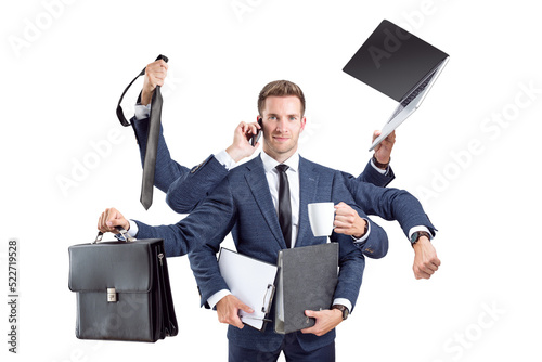 Busy businessman with many arms and office tools photo
