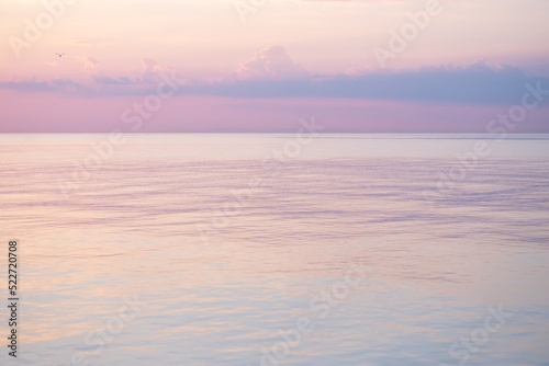 Blurred background sea and sky at sunrise. © lms_lms