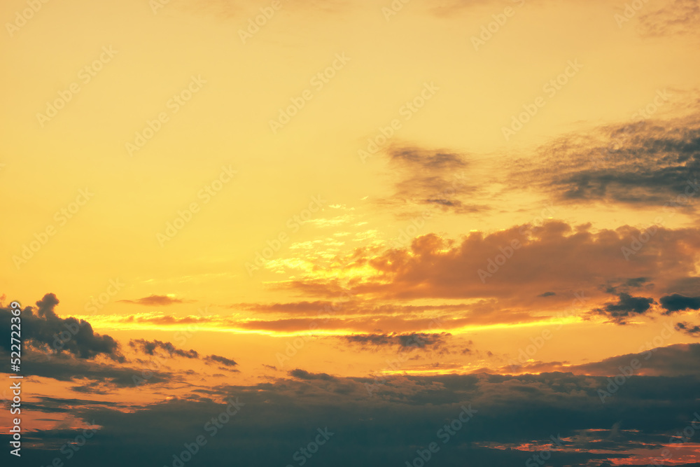 Fototapeta premium Golden hour sunset clouds, place for text, copy-space.