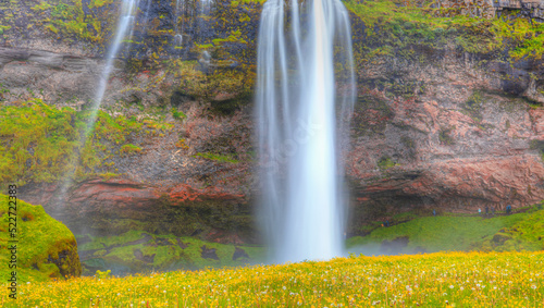 Amazing Seljalandsfoss waterfall with rainbow - Iceland