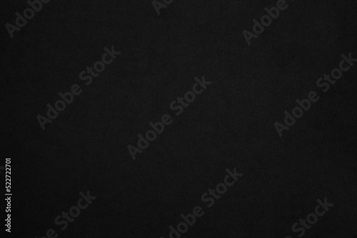 Black paper texture background. Black cardboard sheet page. Old vintage page dark.