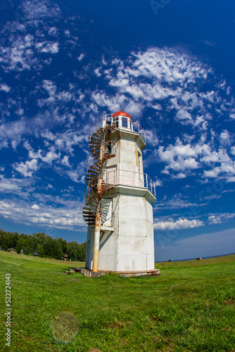 lighthouse against the blue sky 