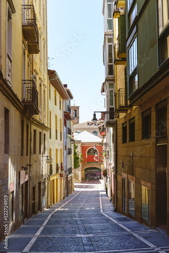Fototapeta Naklejka Na Ścianę i Meble -  Exterior of a modern and ancient architecture alley with colorful buildings in Spain