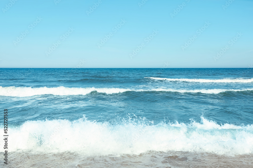 Picturesque view of beautiful sea and blue sky on sunny day