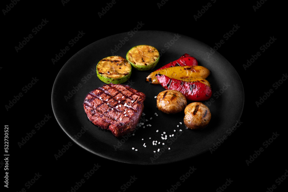Grilled pork steak with mushrooms, zucchini, pepper and salt Grilled pork steak with mushrooms, zucchini, pepper and salt
