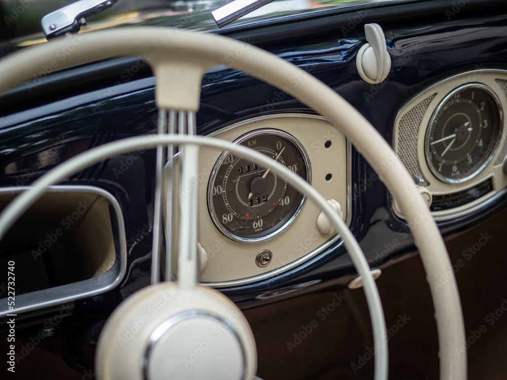 Dashboard and steering wheel of old-timer car Dashboard and steering wheel of old-timer car