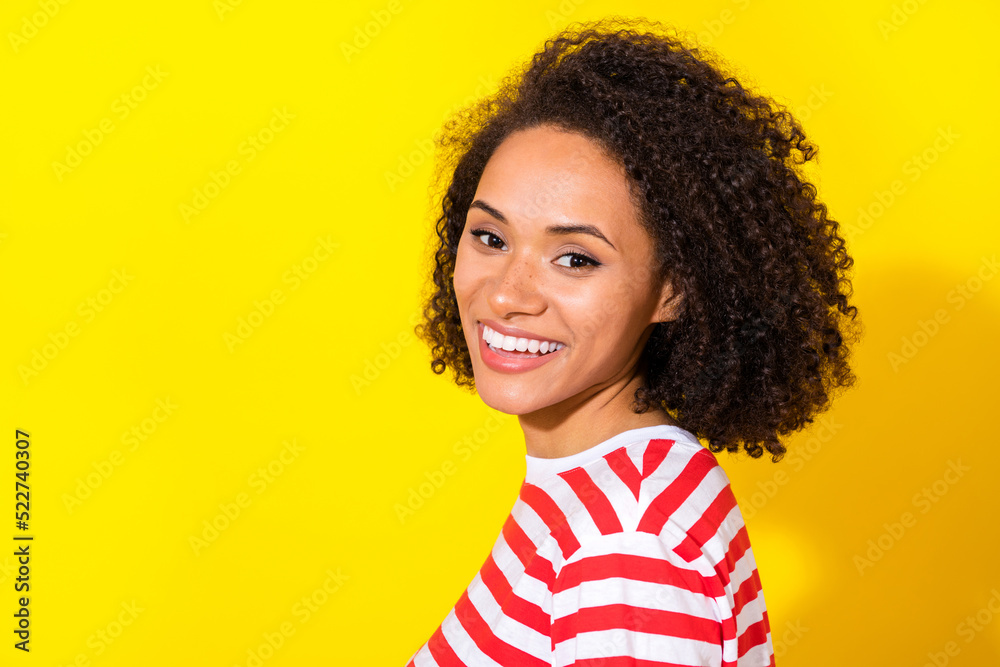 Profile photo of brunette pretty lady wear red striped t-shirt isolated on bright yellow color background Profile photo of brunette pretty lady wear red striped t-shirt isolated on bright yellow color background