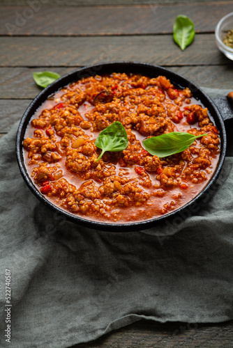 Top view of bolognese sauce in pan comfort food making pasta beef ragu