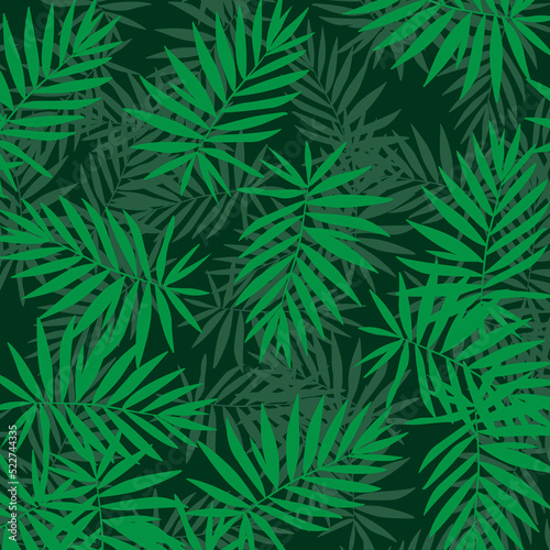 vertical garden with tropical green leaf pattern background © wasan