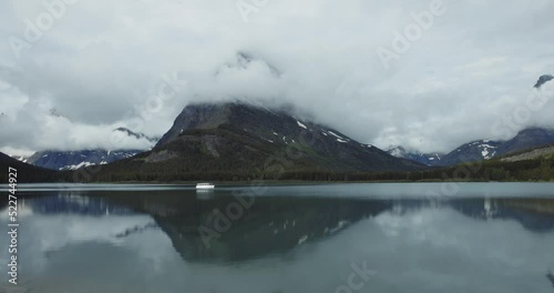 Glacier National Park with tour boat on foggy day photo