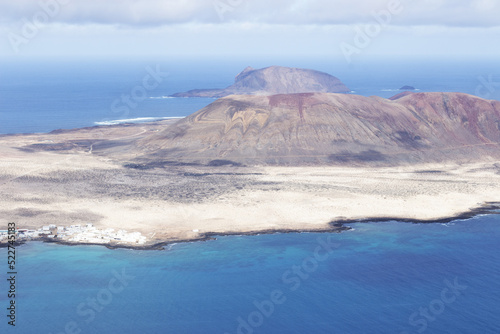  Panoramic view of the volcanic island of La Graciosa in the Atlantic Ocean, Canary Islands, Spain