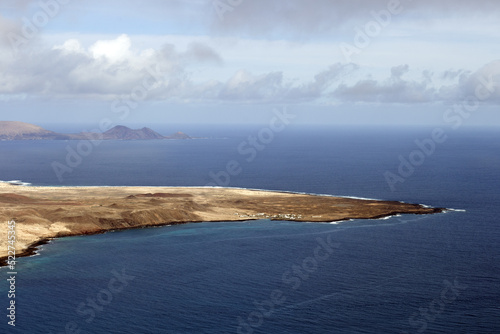  Panoramic view of the volcanic island of La Graciosa in the Atlantic Ocean, Canary Islands, Spain