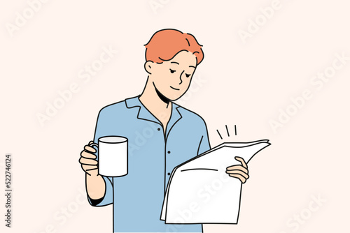 Happy young man in pyjama drinking coffee reading newspaper. Smiling male enjoy morning at home. Daily routine. Vector illustration. 
