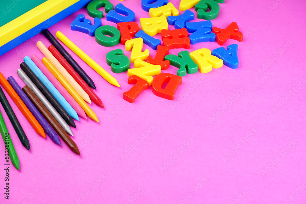 Alphabet on color background. School and education concept. Empty space for text and design Alphabet on color background. School and education concept. Empty space for text and design