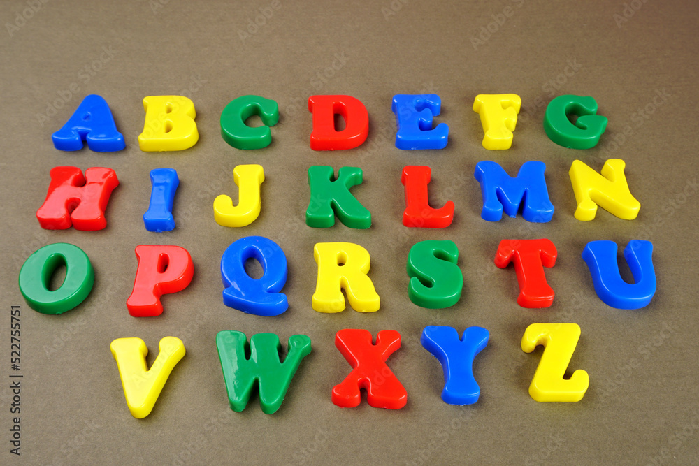 Alphabet on color background. School and education concept. Empty space for text and design Alphabet on color background. School and education concept. Empty space for text and design