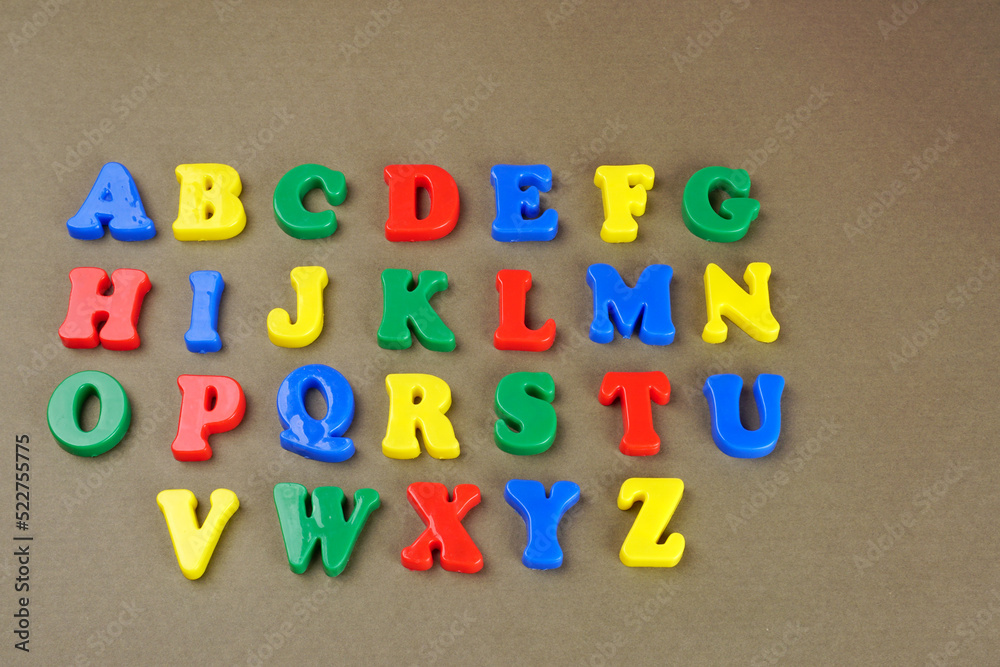 Alphabet on color background. School and education concept. Empty space for text and design Alphabet on color background. School and education concept. Empty space for text and design
