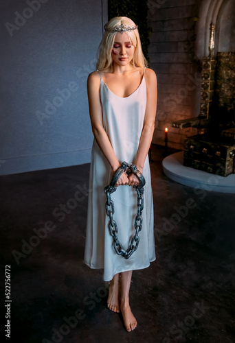 portrait fantasy woman princess hands in chains prison handcuffs steel chain shackles Fototapeta
