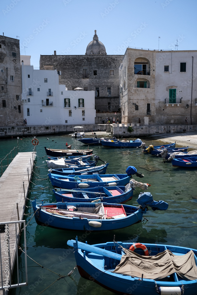 Fisherman boats are seen in the old port of historical city of Monopoli.