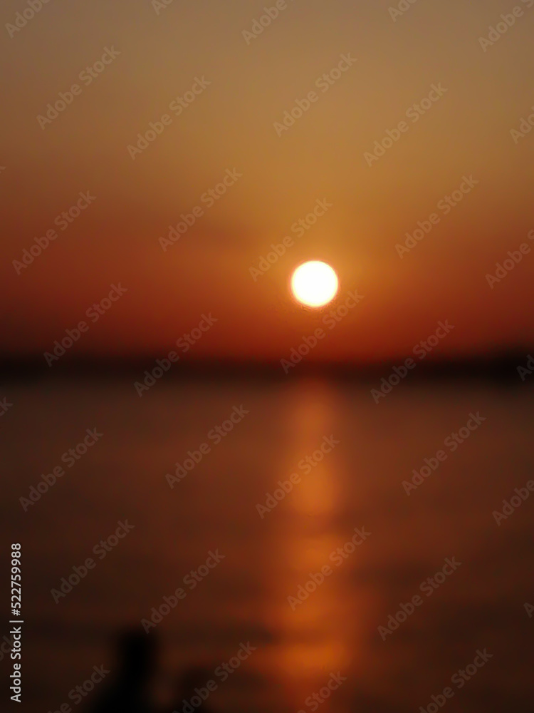 blurred background, sunset in the sea, sunset over the sea