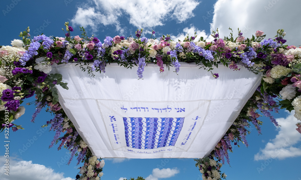 Chuppa wedding canopy under which Jewish couple get married. Canopy is