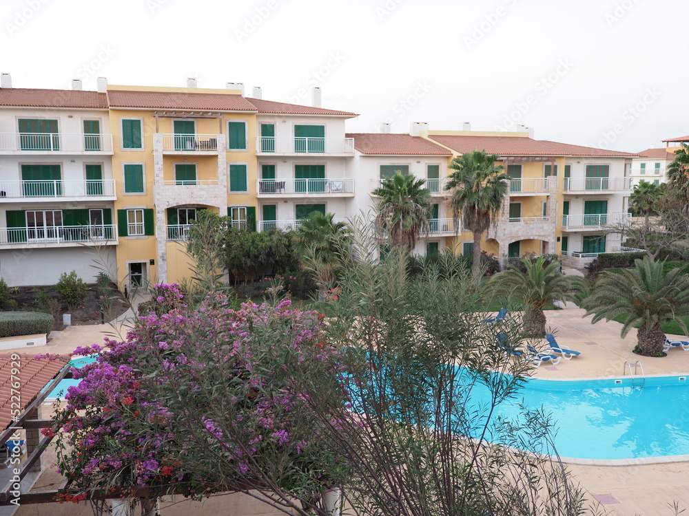 Fototapeta premium Mansion buildings and exotic trees on Sal island in Cape Verde