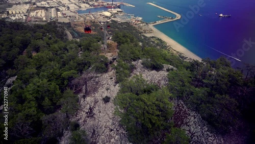 View from a cable car of the mountain peak and harbour below photo