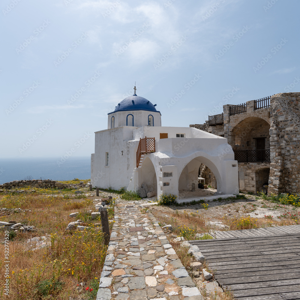 Beautiful greek church with the Aegean Sea in the background on Astypalea Island in Greece.