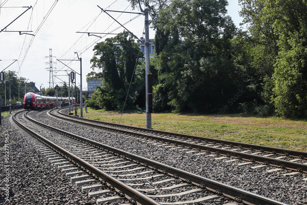 railroad passing through the city with an express train railroad passing through the city with an express train