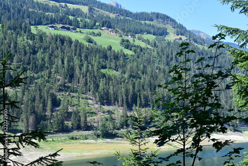 Beautiful landscape at Ulten Valley in Southtyrol with mountains and the Zoggler barrier lake  photo