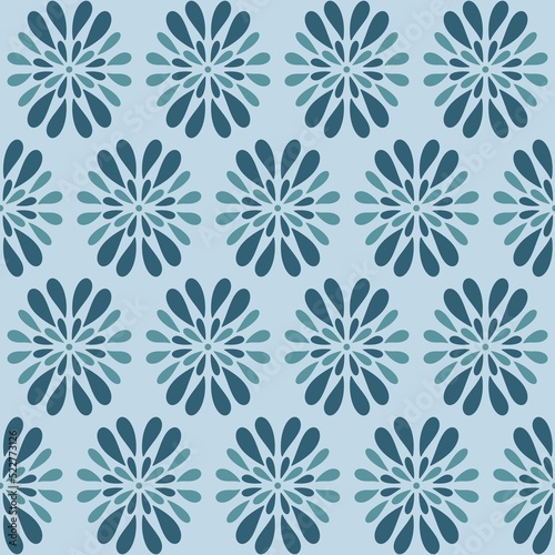 Abstract flat snowflakes seamless pattern. Blue floral background. Classic print great for fabric textiles and wrapping.