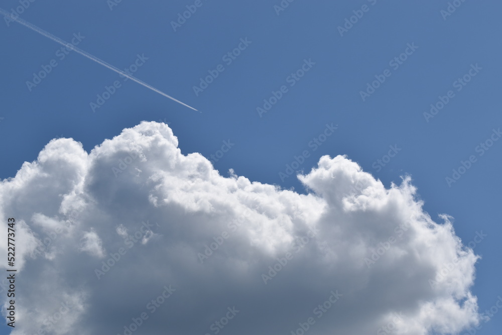 A plane crosses the sky, Sainte-Apolline, Québec, Canada A plane crosses the sky, Sainte-Apolline, Québec, Canada