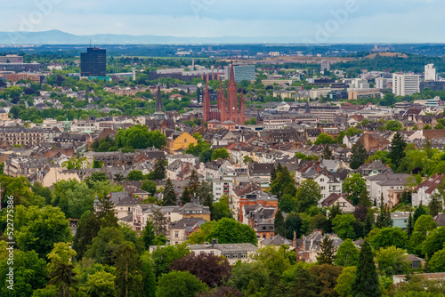 Great panoramic view of the historic Old Town of Wiesbaden, state capital of Hesse, Germany, with the famous neo-Gothic red all-brick Marktkirche (Market Church) in the centre at Schlossplatz.  photo