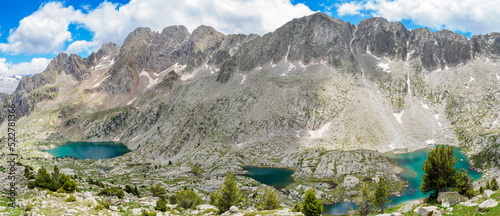 Perramo lakes and peaks in Benasque Valley, Spain photo