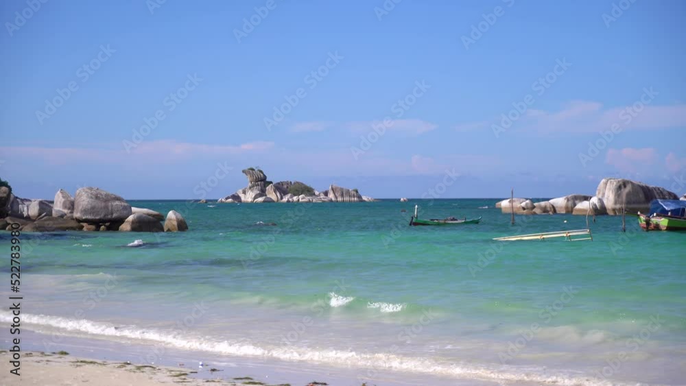 Tropical beach with sand and small ocean waves
Tropical beach with sand and small ocean waves