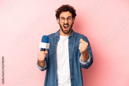 Canvas Print crazy bearded man shouting aggressively with an angry expression
