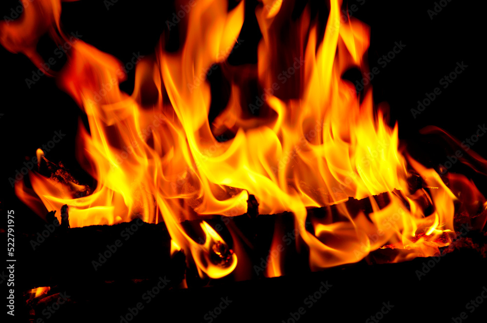 Heat energy heap closely, red and yellow, thermal energy at the fuel point during the night / lights on a black background Heat energy heap closely, red and yellow, thermal energy at the fuel point during the night / lights on a black background