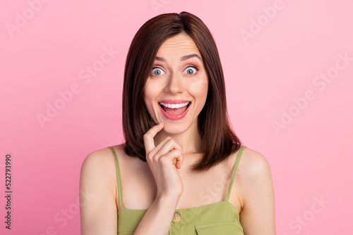 Photo of speechless staring lovely woman dressed khaki overall finger on chin impressed unexpected sale isolated on pink color background
