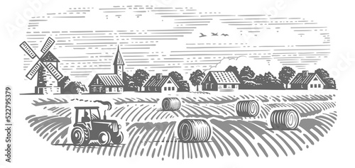 Field with haystacks. Farming landscape with tractor