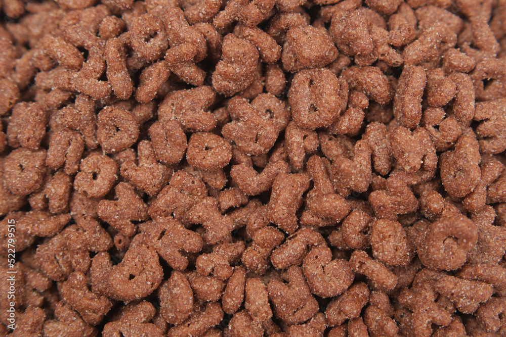 chocolate corn flakes in a bowl on table chocolate corn flakes in a bowl on table