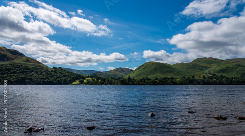 A view across Ullswater in the Lake District with the lake in the foreground